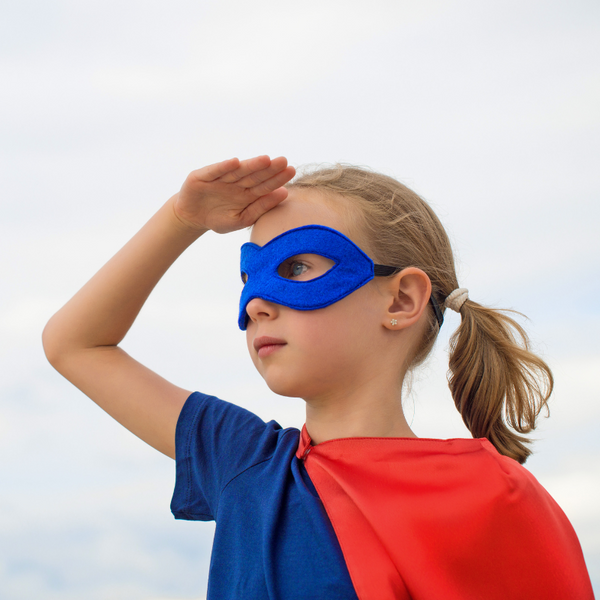 a girl in superhero costume