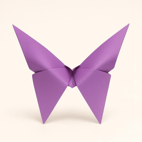 Purple origami butterfly on a white background